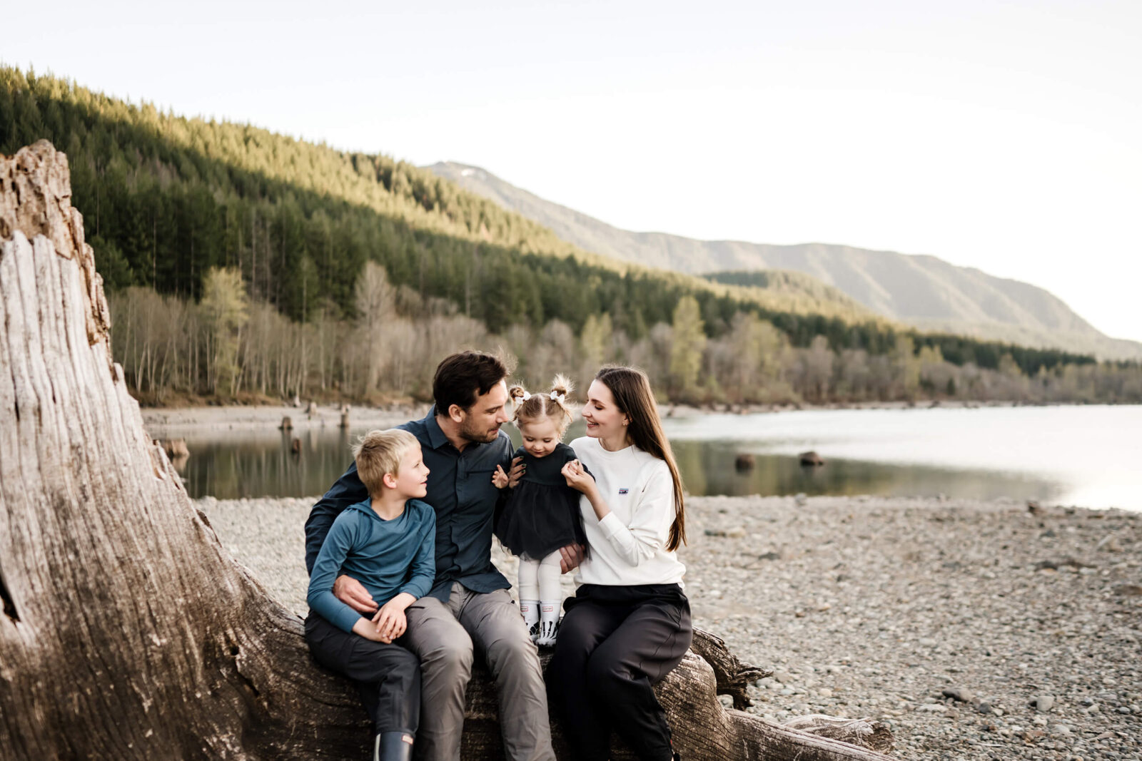 Family photo session of mom, dad, and two kids at Rattlesnake Lake