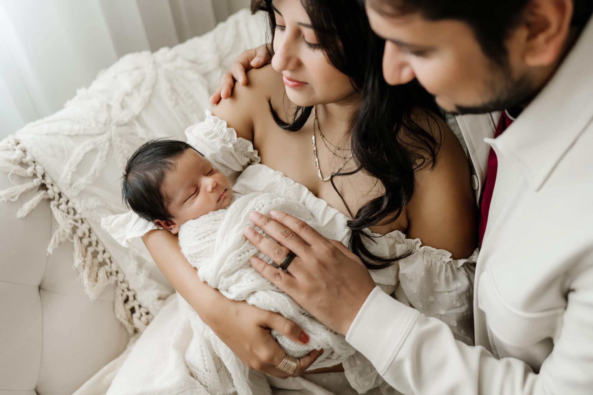 Unique newborn photography with parents