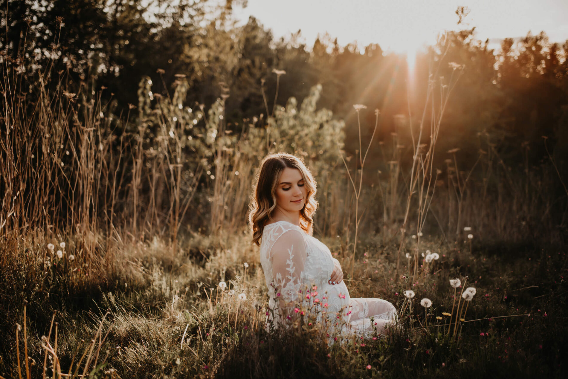 Outdoor maternity photoshoot in the Seattle area with mom smiling