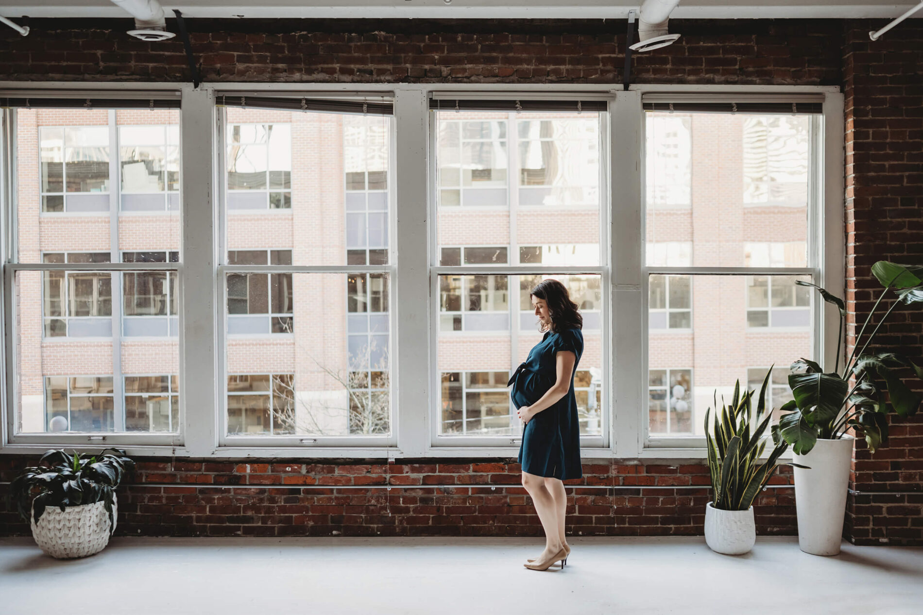 Pregnancy photo shoot in a studio