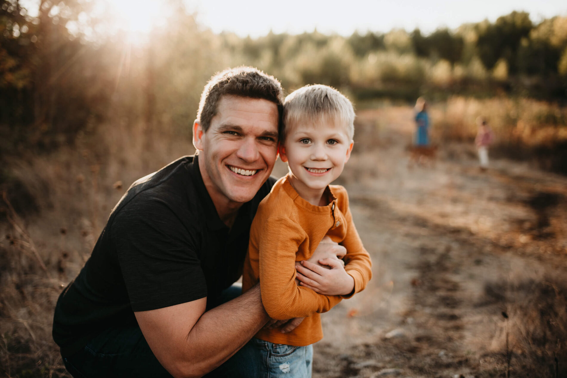 A close-up of dad posing with his son