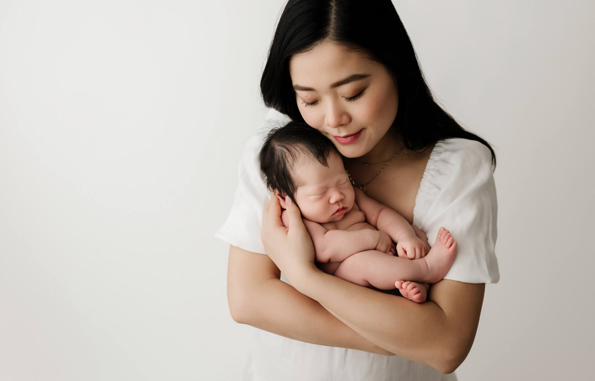 Family newborn photos with mom and baby girl