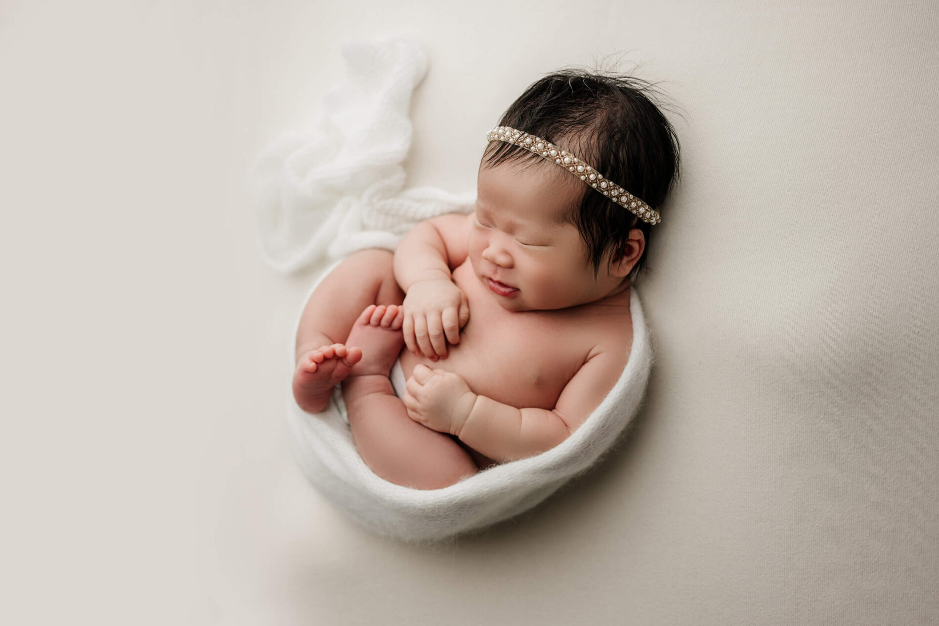 Studio newborn baby girl photo shoot
