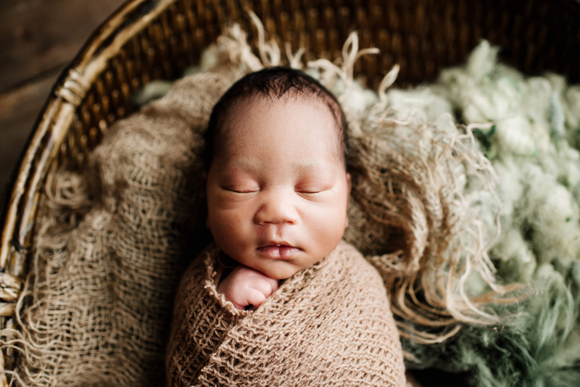 Twin newborn photo shoot in a studio