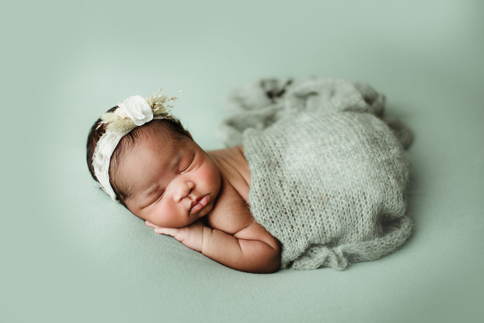 Twin newborn photo in a studio