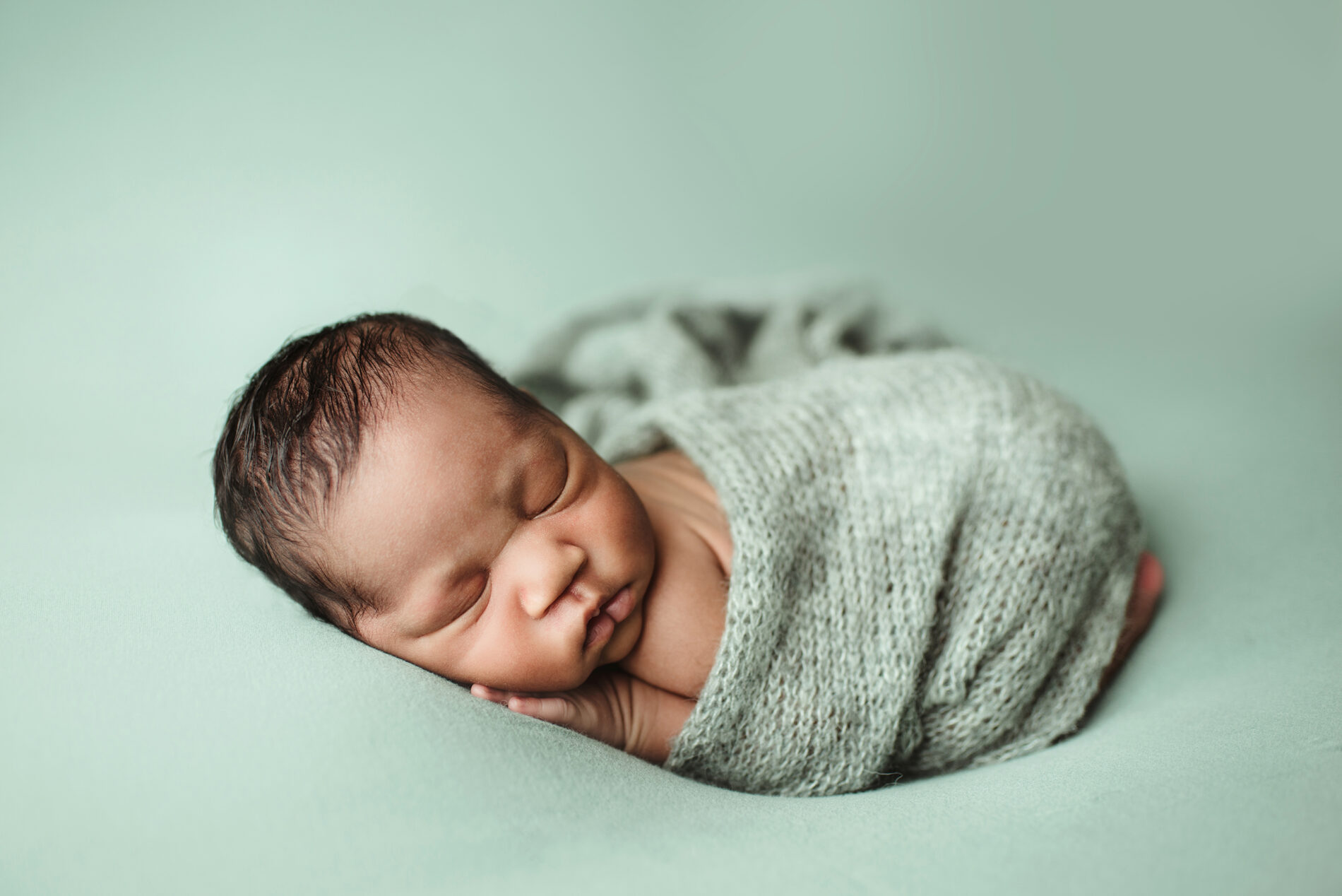 Twin newborn photo in a studio