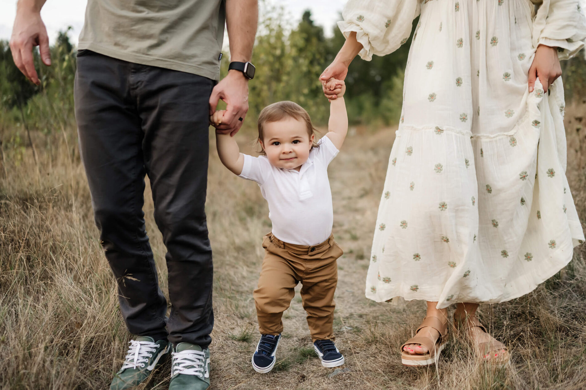 Candid family photos in Redmond WA with mom, dad, and toddler boy