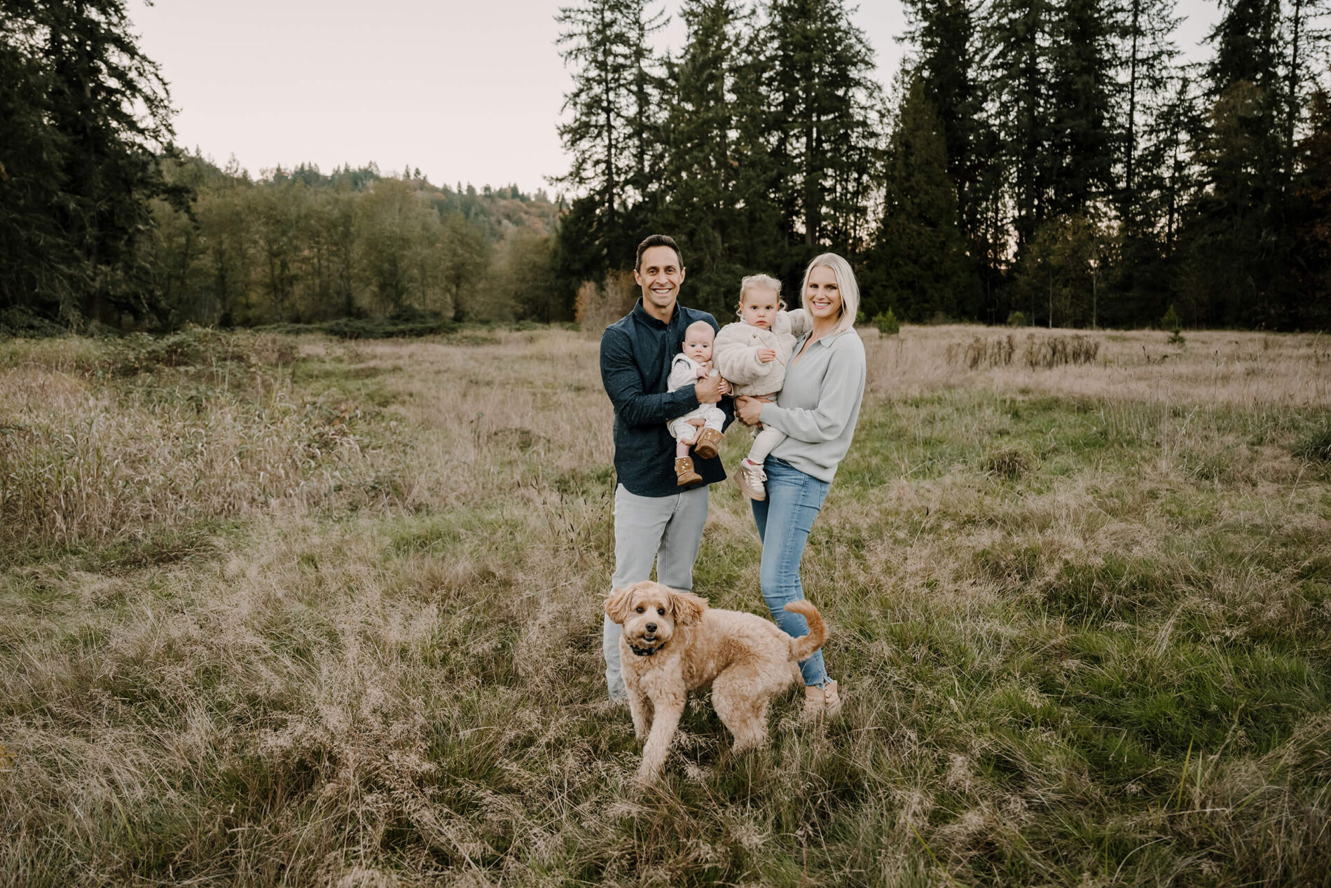 Family photo shoot in the Redmond area of mom, dad, two daughters and a pet