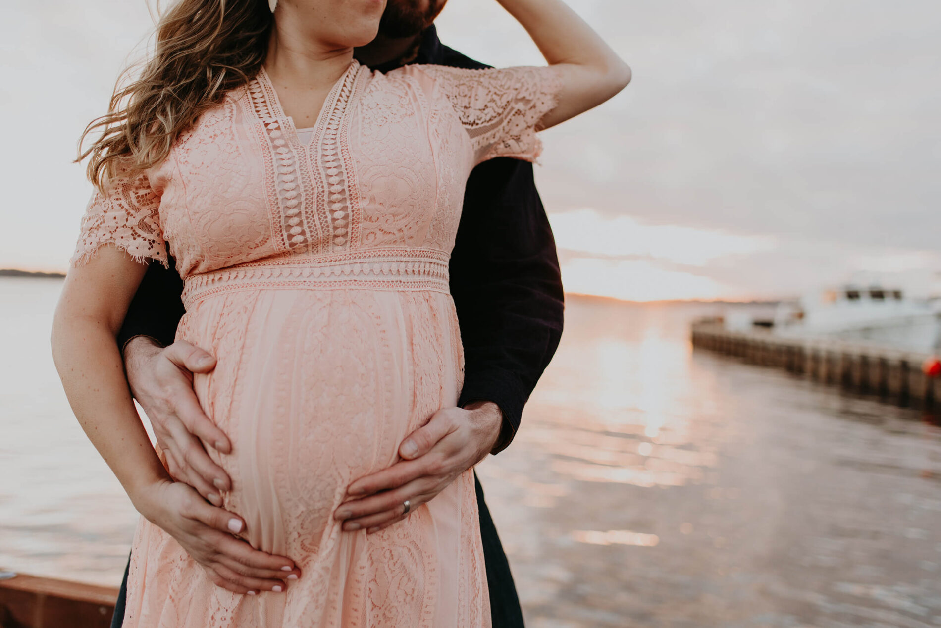 Couple posing during a winter maternity photo shoot in Kirkland, WA