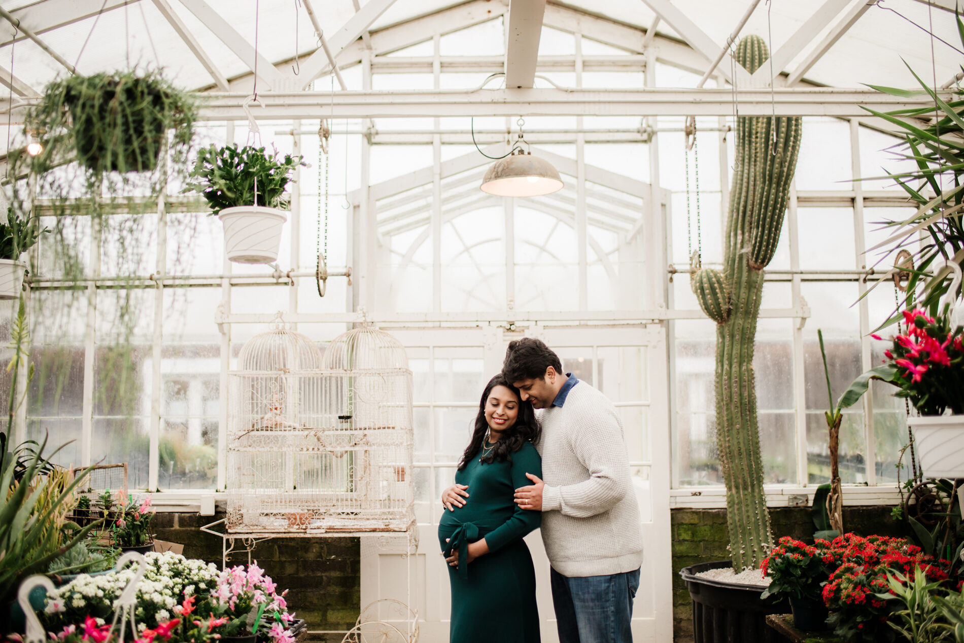 Unique winter pregnancy photo shoot idea in a nursery