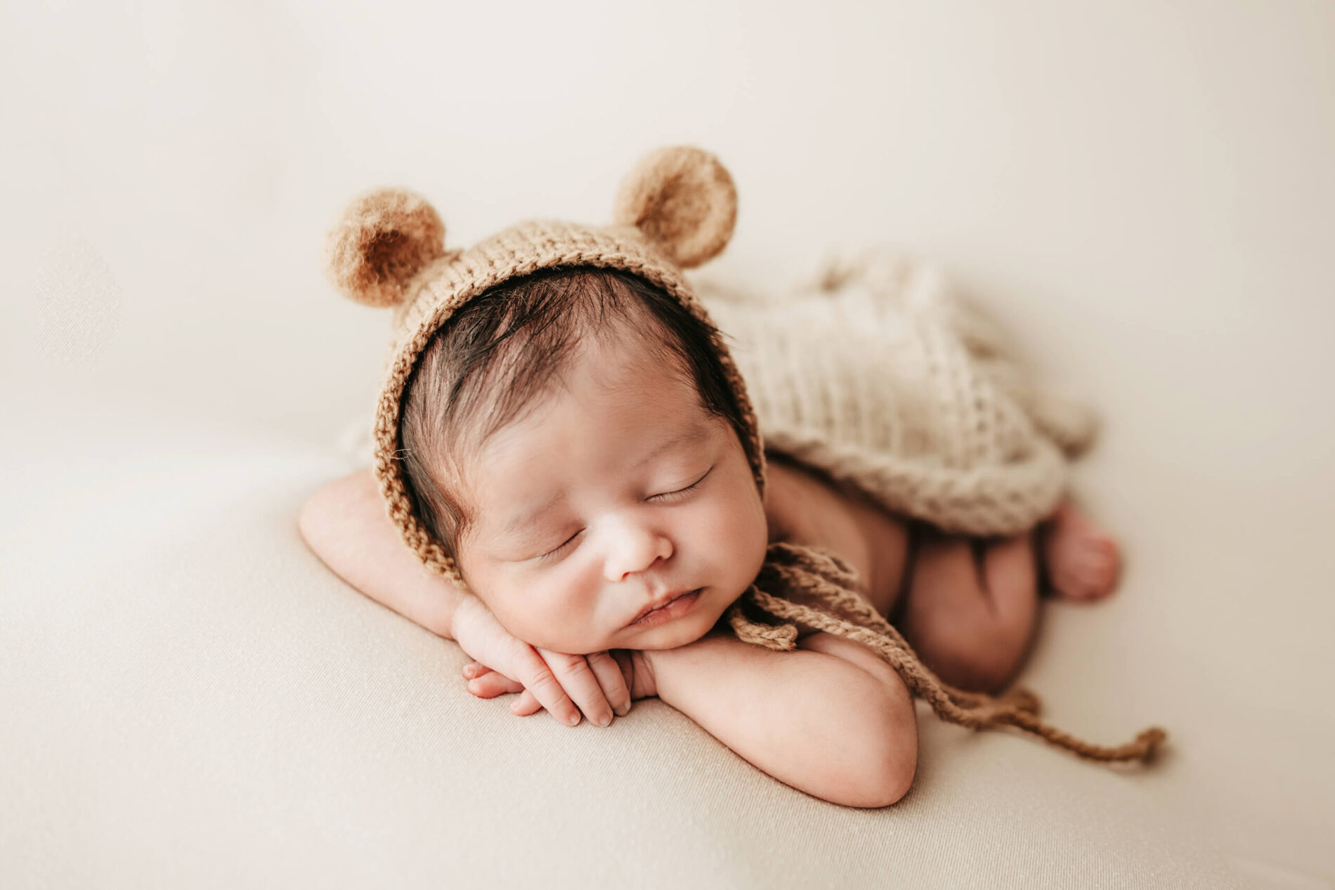 Seattle newborn photography, posed newborn photo of sleeping baby boy