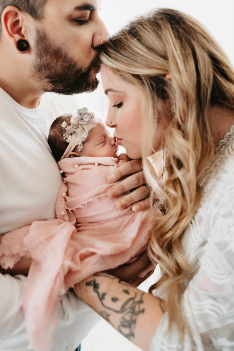 Seattle natural newborn photography, unique photo of baby with parents