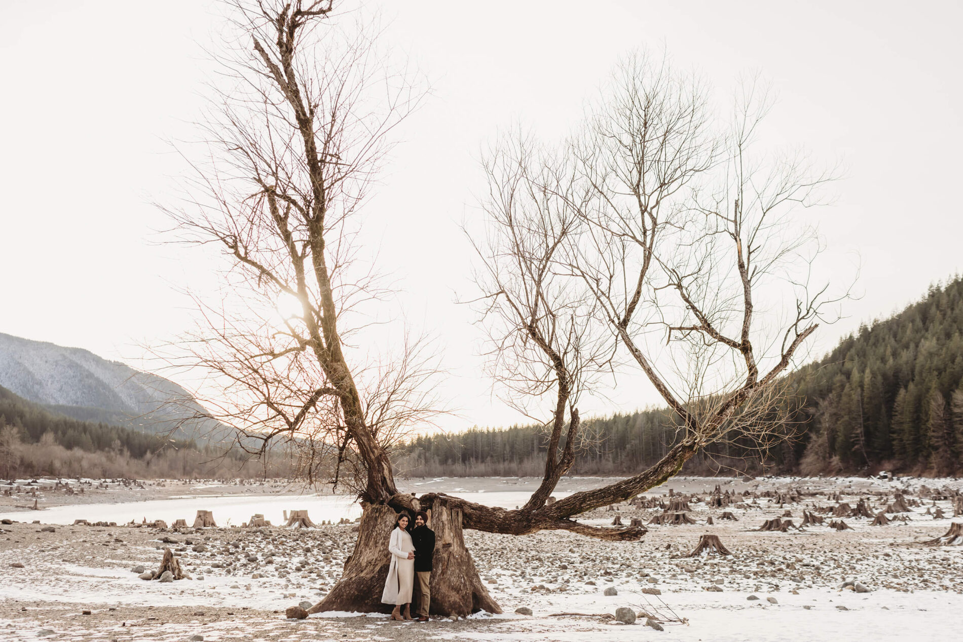 Seattle maternity photo shoot during winter, mountains and lake in the background
