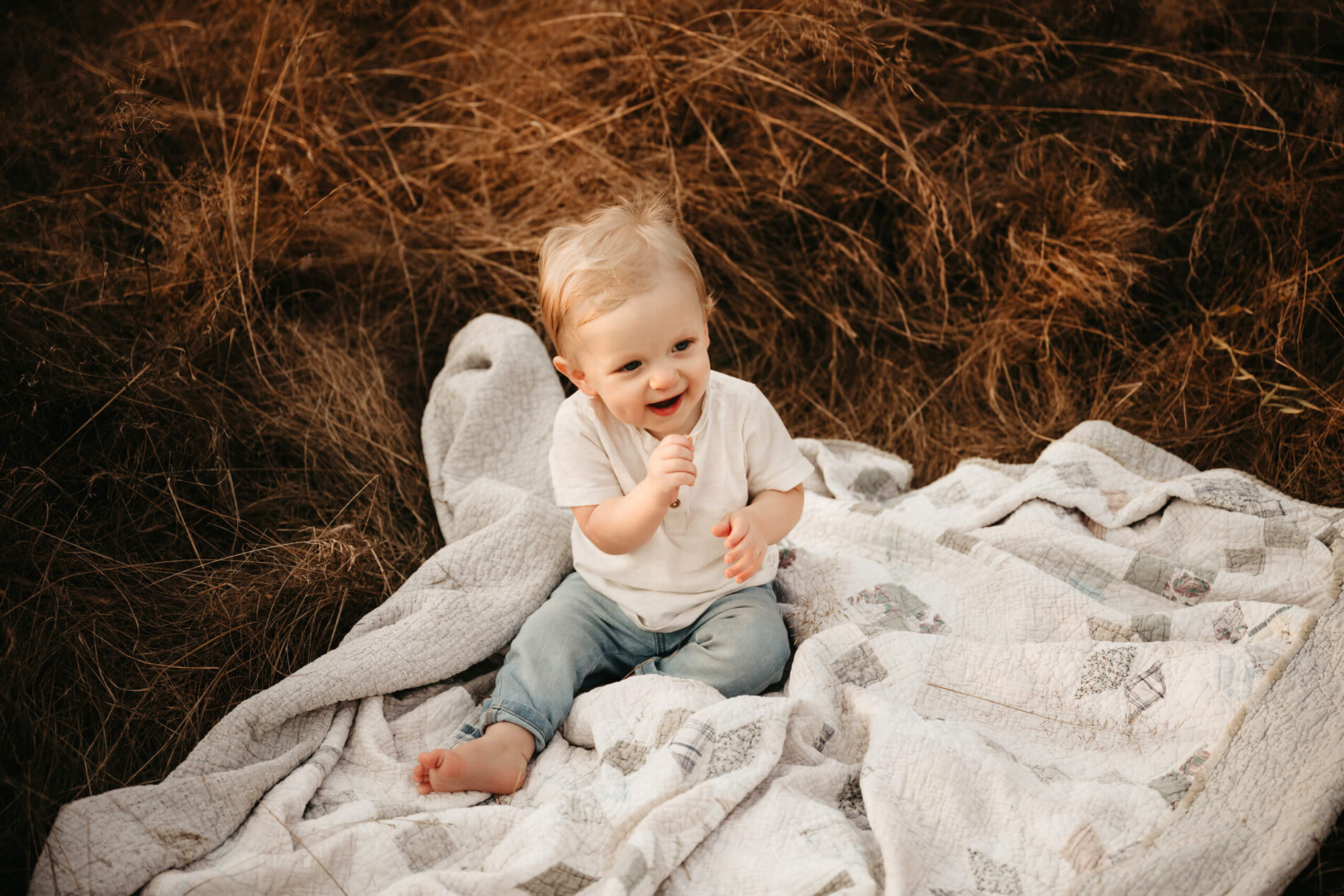Children photography in Seattle, toddler sitting in a field