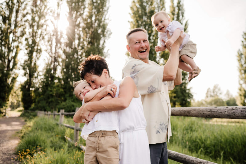 Bellevue area lifestyle family photoshoot with grandparents, grandpa and grandma playing with two grandsons