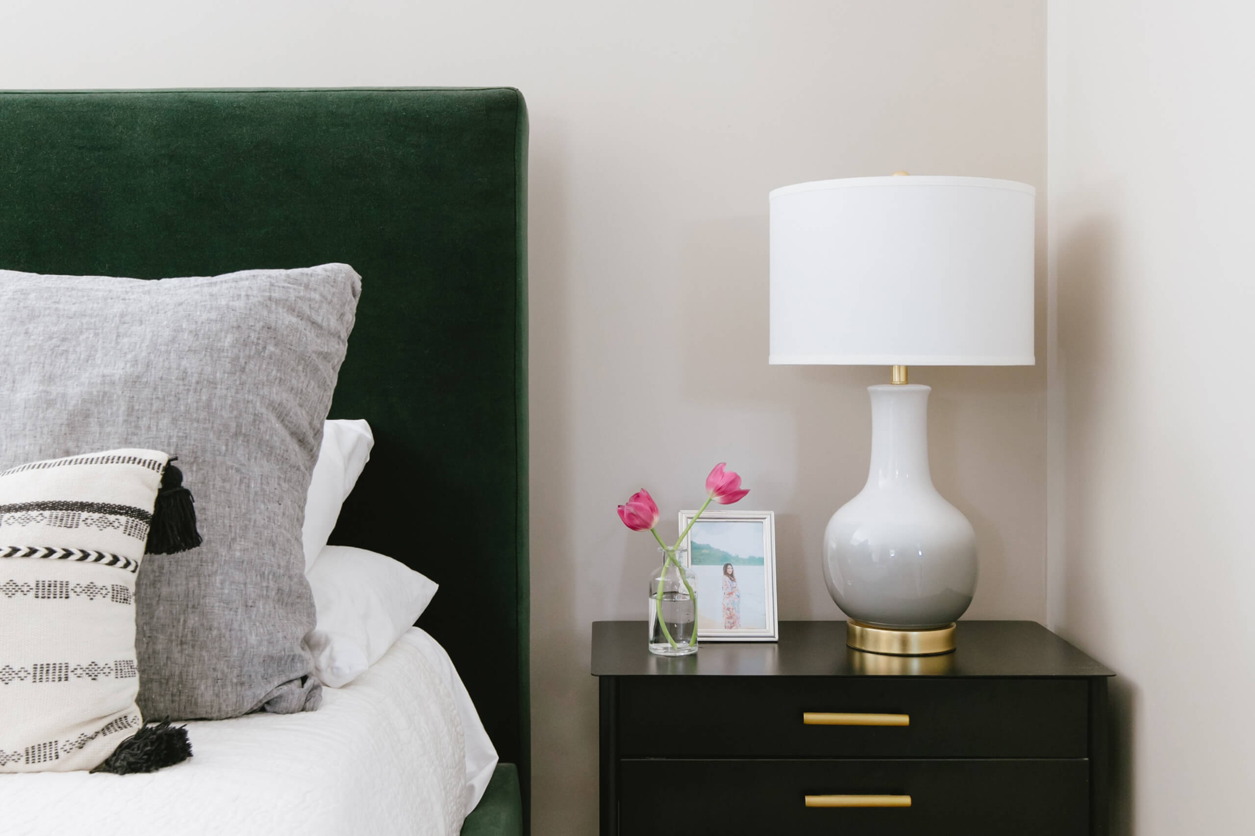 Framed maternity portrait on a nightstand
