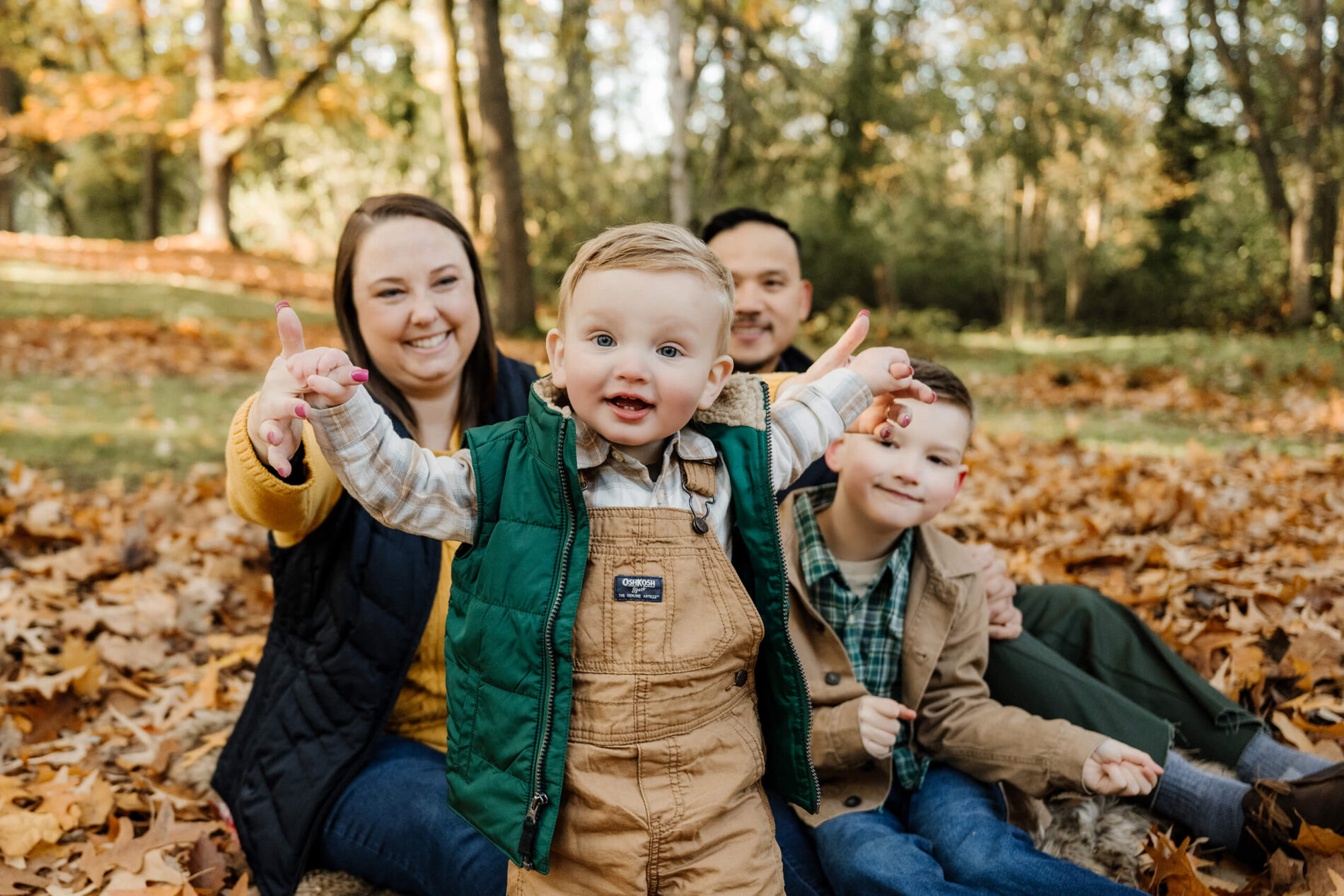 Natural posing of family of four during photoshoot in Seattle