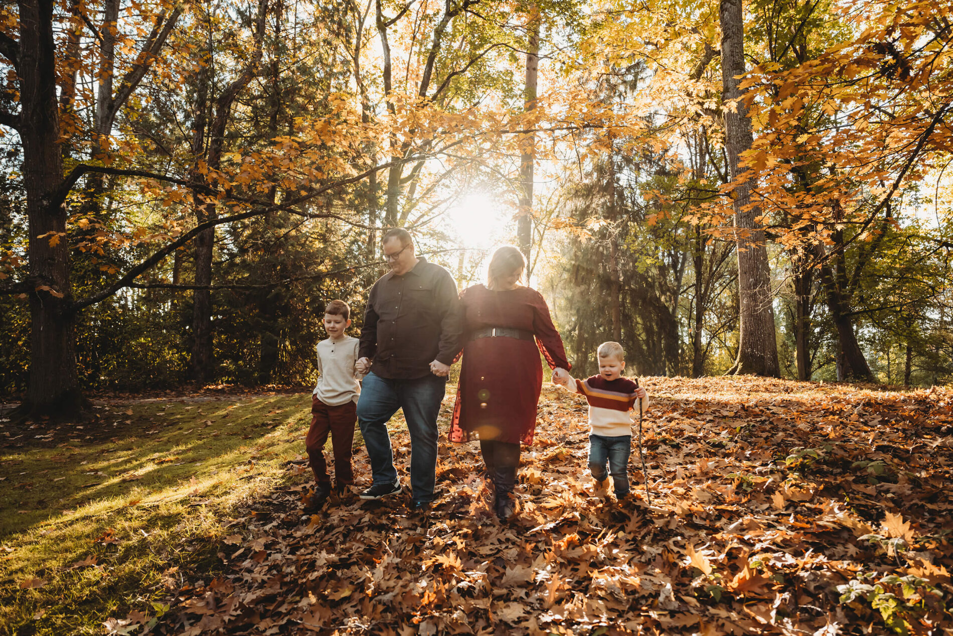 Family of four walking during photoshoot in Seattle