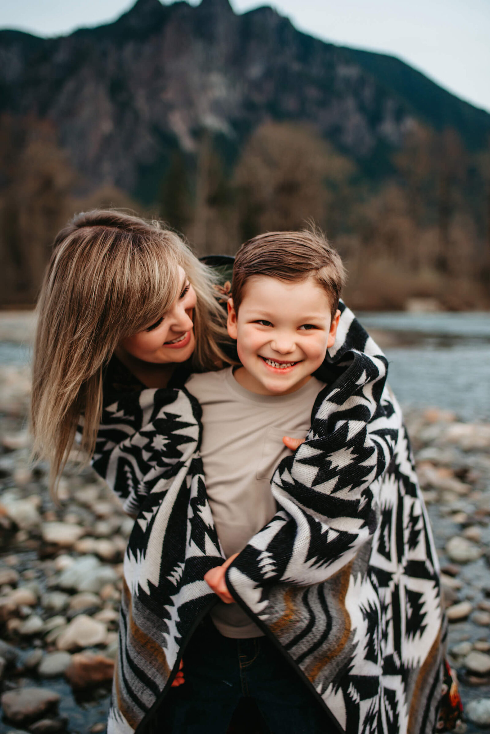 Seattle family photography of mom with her son with mountain in the background