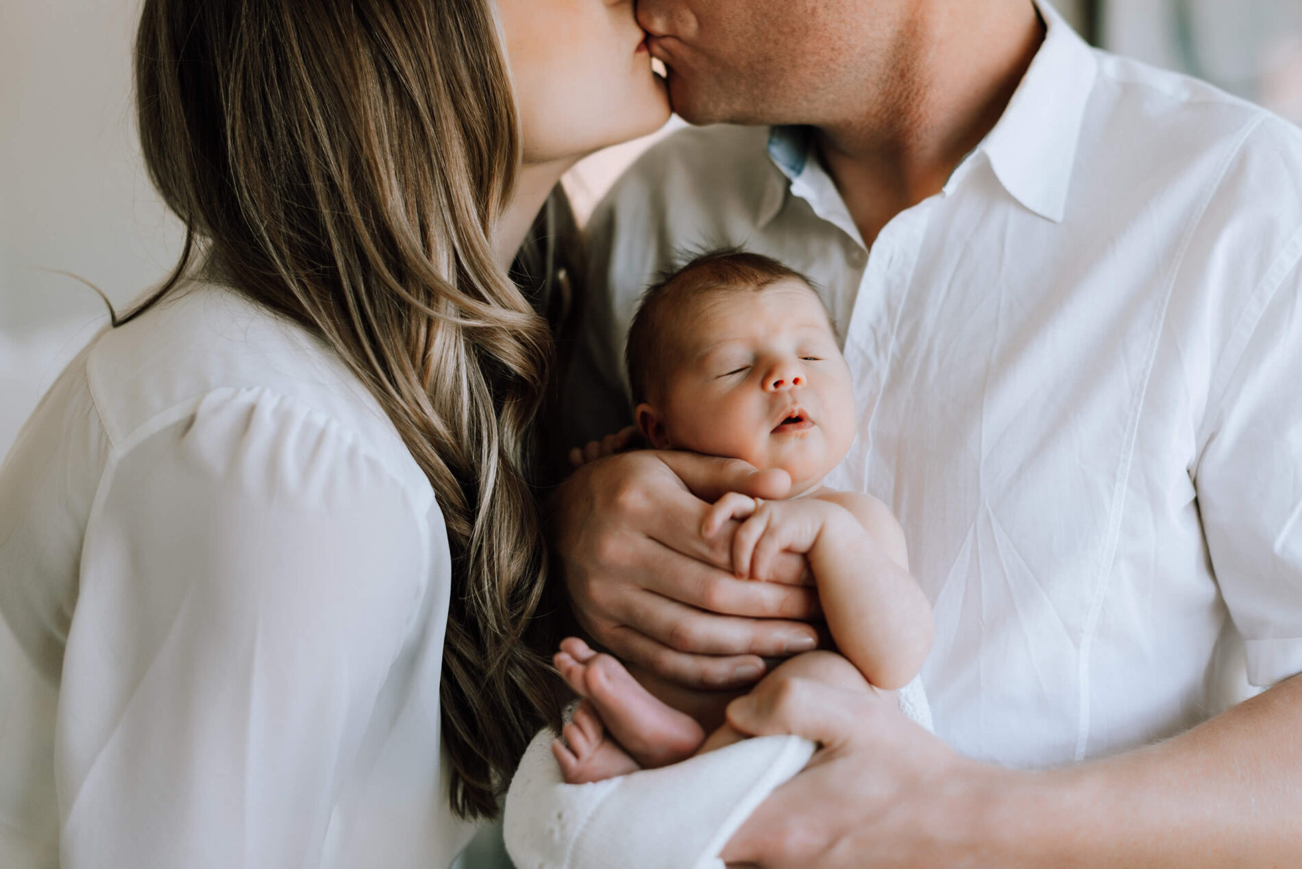 Lifestyle newborn photo session at your home in Seattle