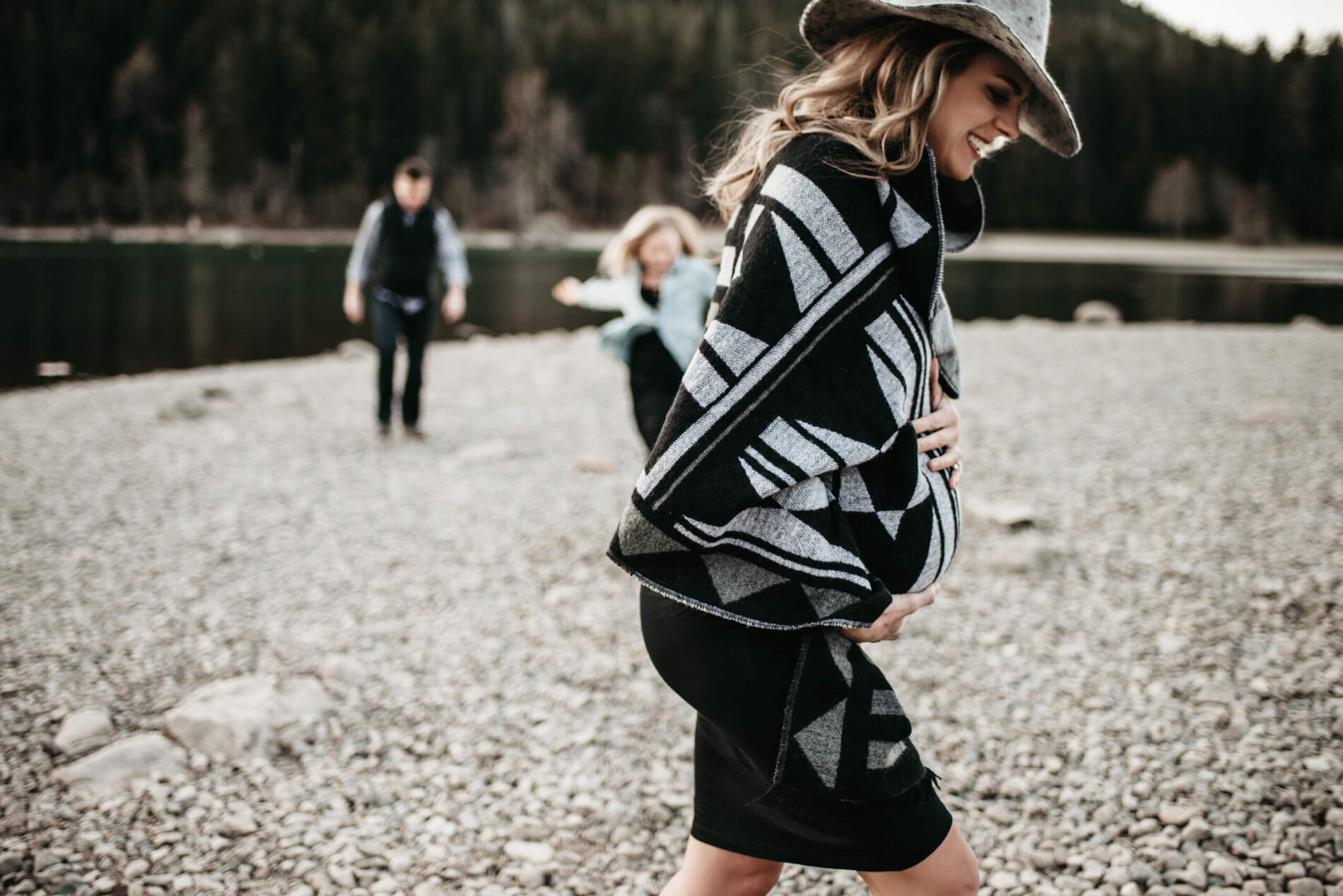 Natural posed maternity photoshoot at a lake in Seattle area