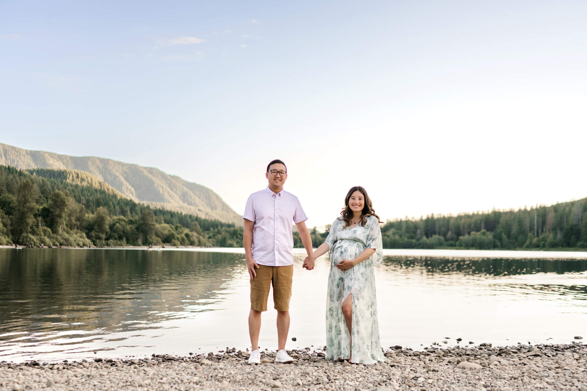 Outdoor maternity portrait near Bellevue WA with lake and mountain view