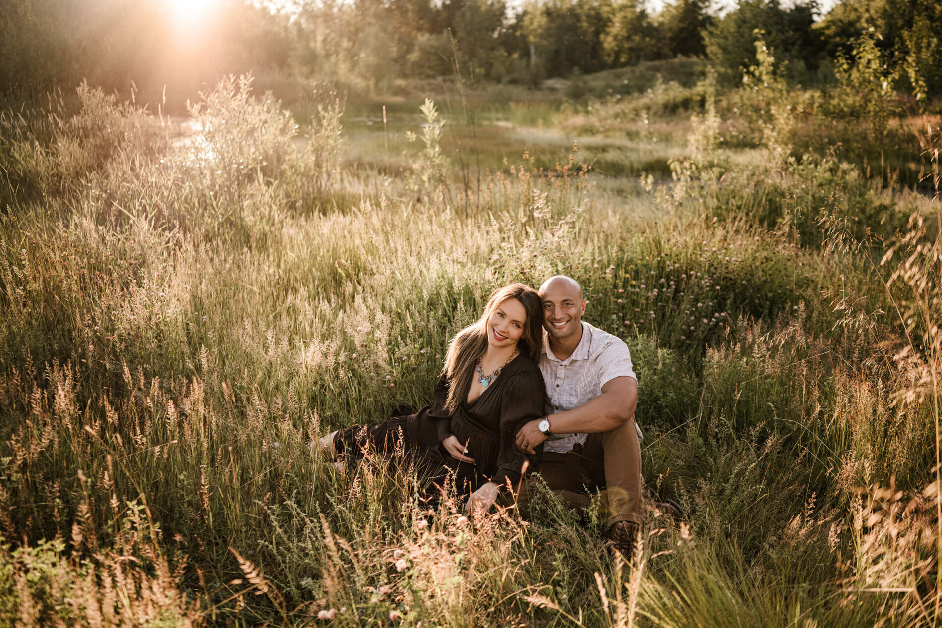 Summer maternity photo in an open field near Bellevue WA