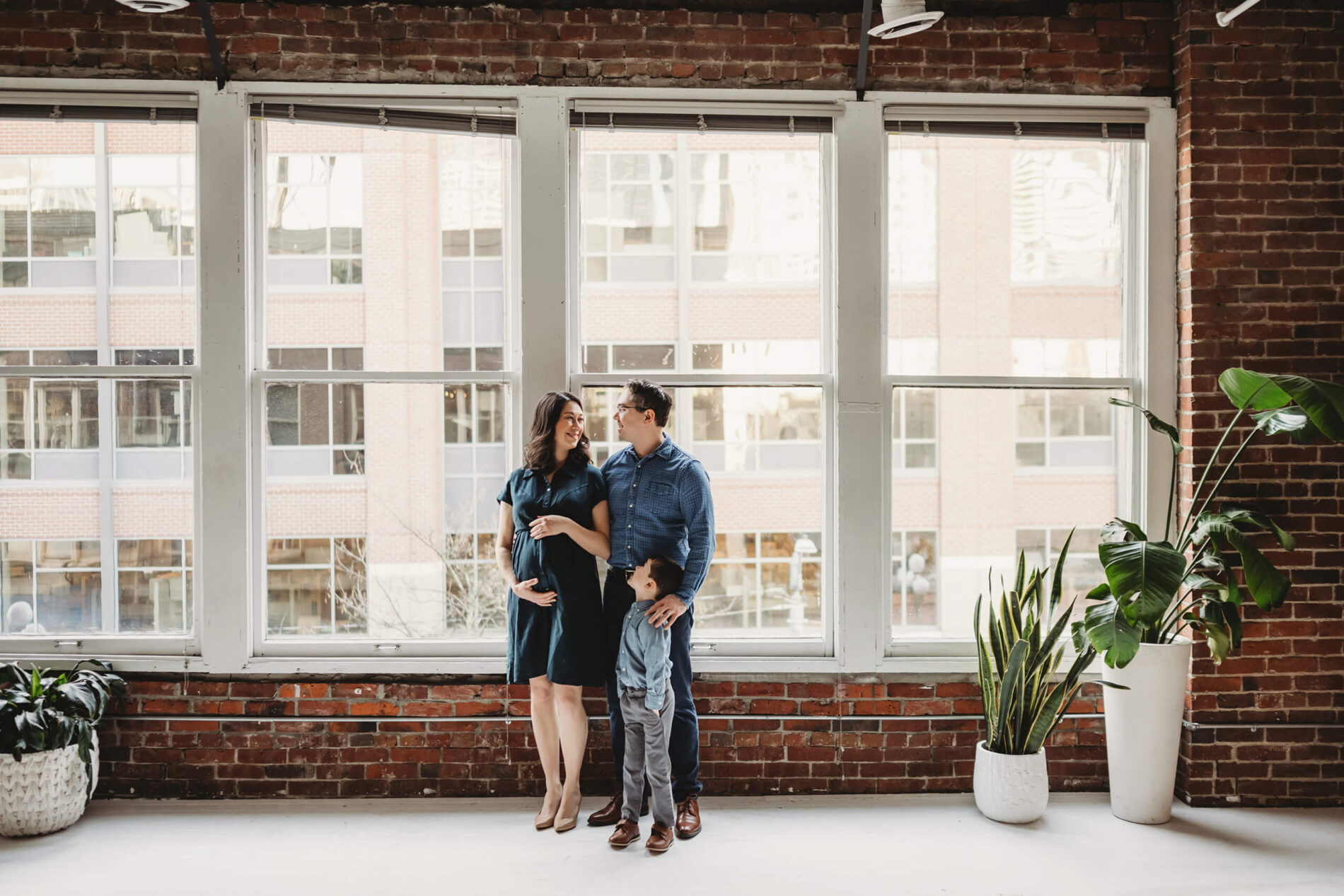 Family maternity photoshoot in a studio near Bellevue WA