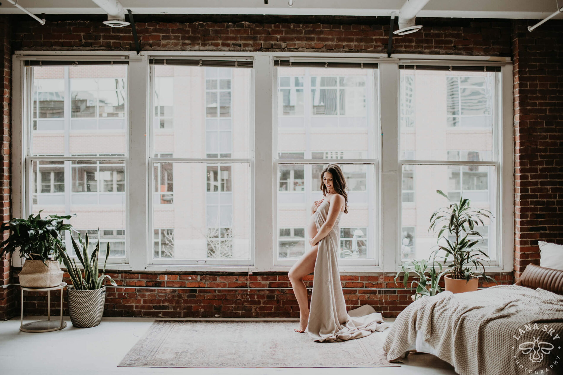 Maternity photoshoot in a natural light studio near Bellevue WA