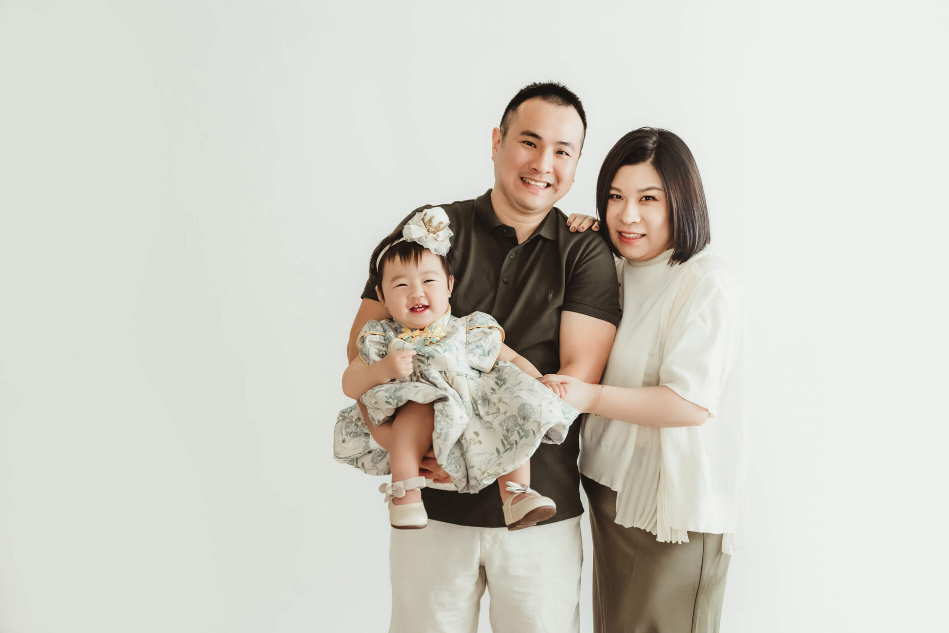 Family of three studio portrait