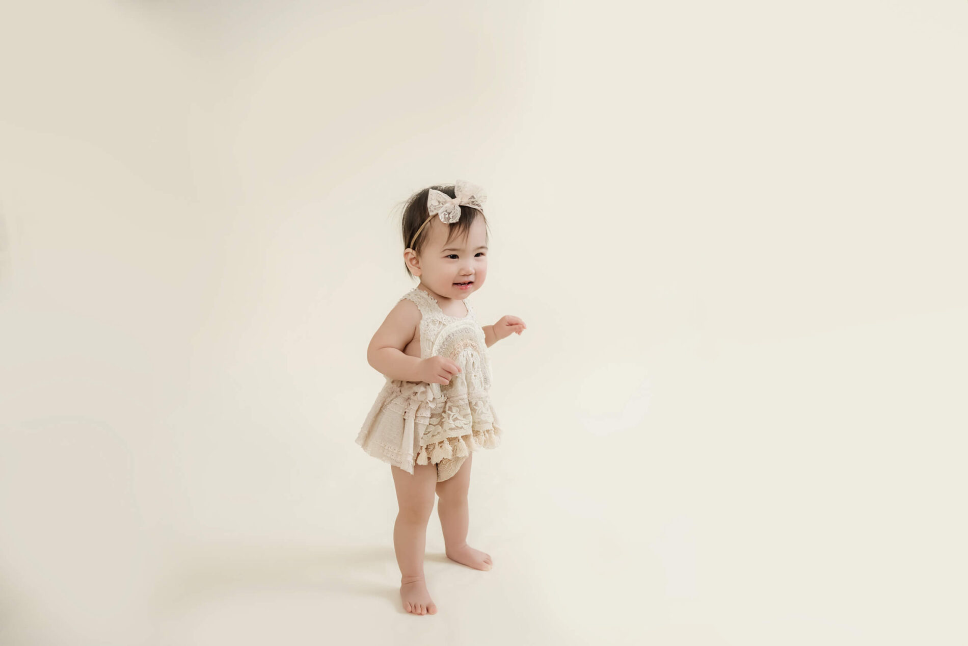 Happy toddler during a studio photoshoot in Bellevue WA
