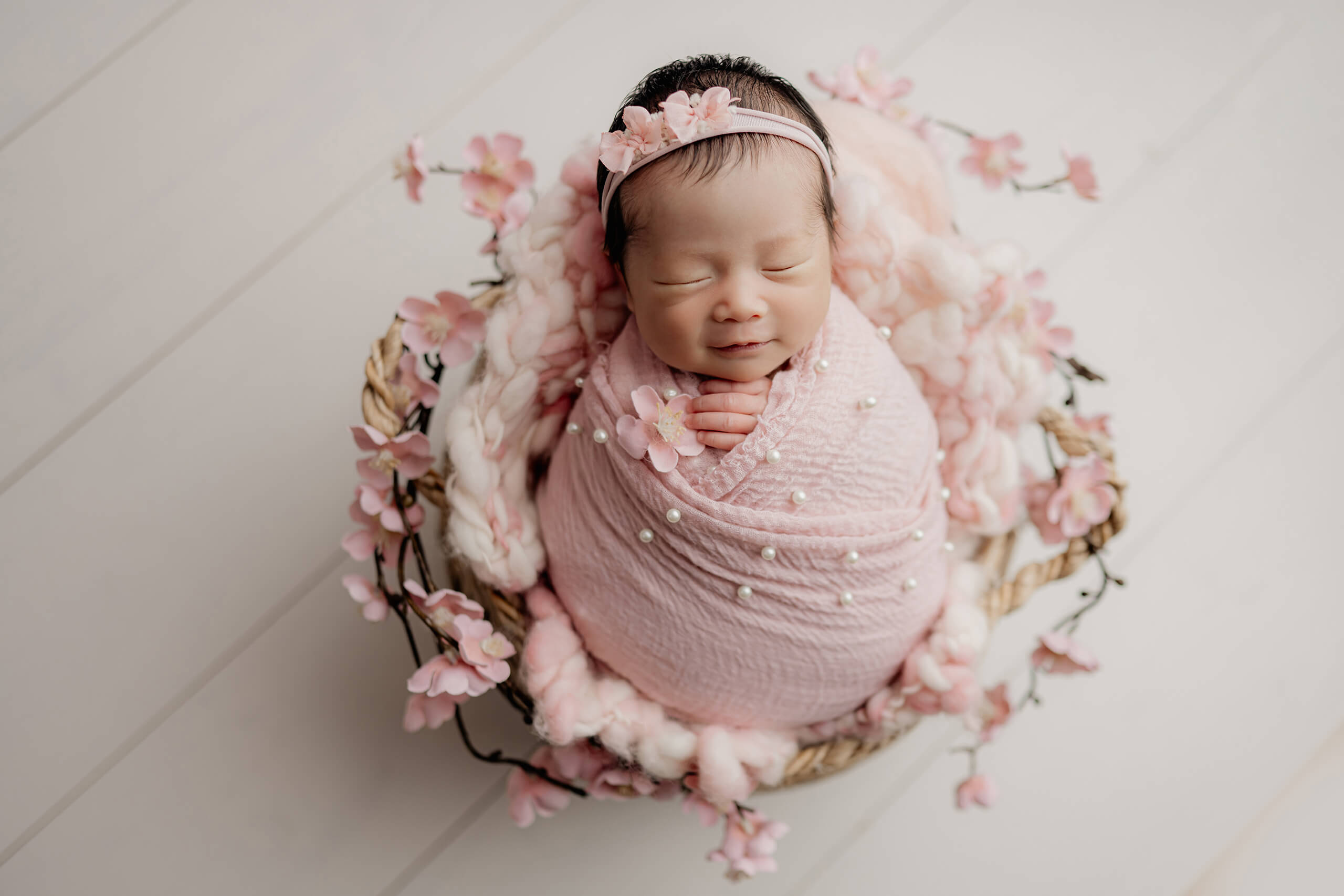 Newborn photography with beautiful floral props near Bothell WA