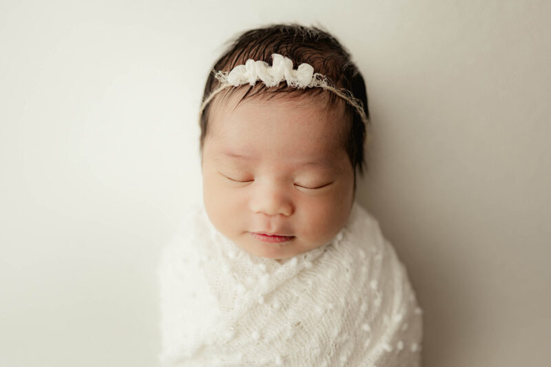 Elegant newborn portrait taken in a full service studio near Bothell WA