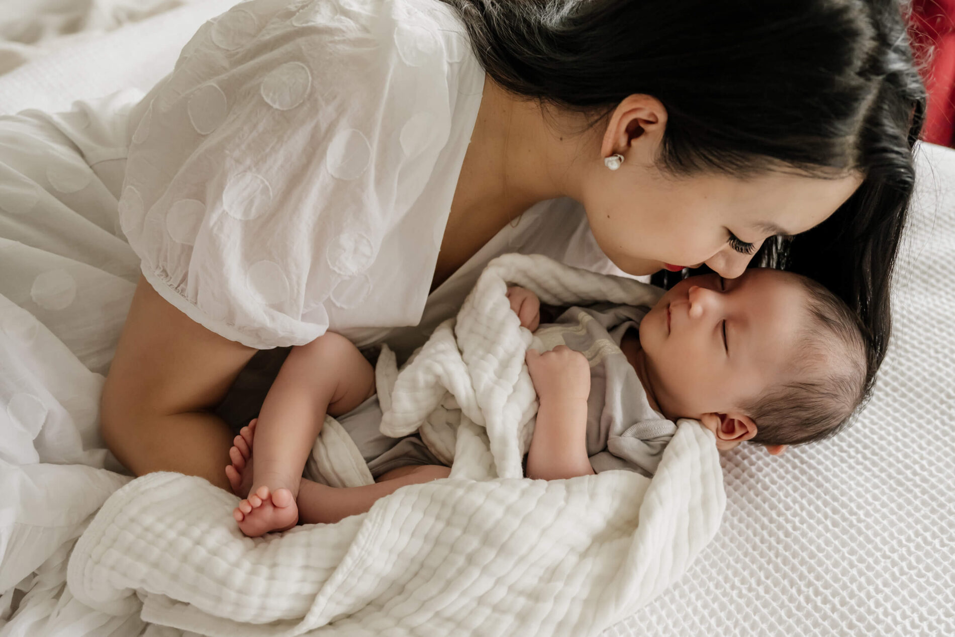 Natural newborn posing in a client's home