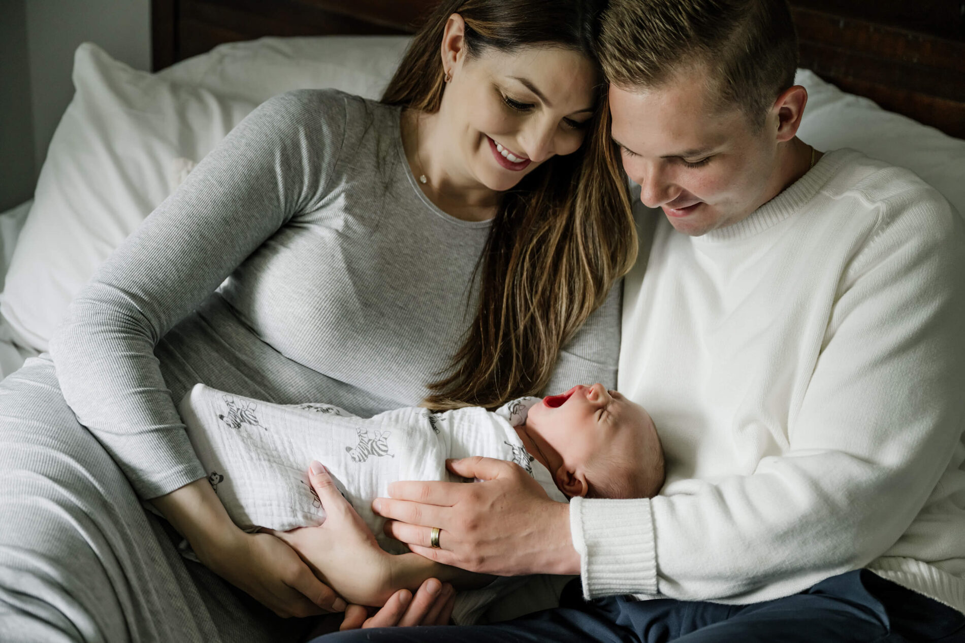 Relaxing newborn photoshoot in a client's home