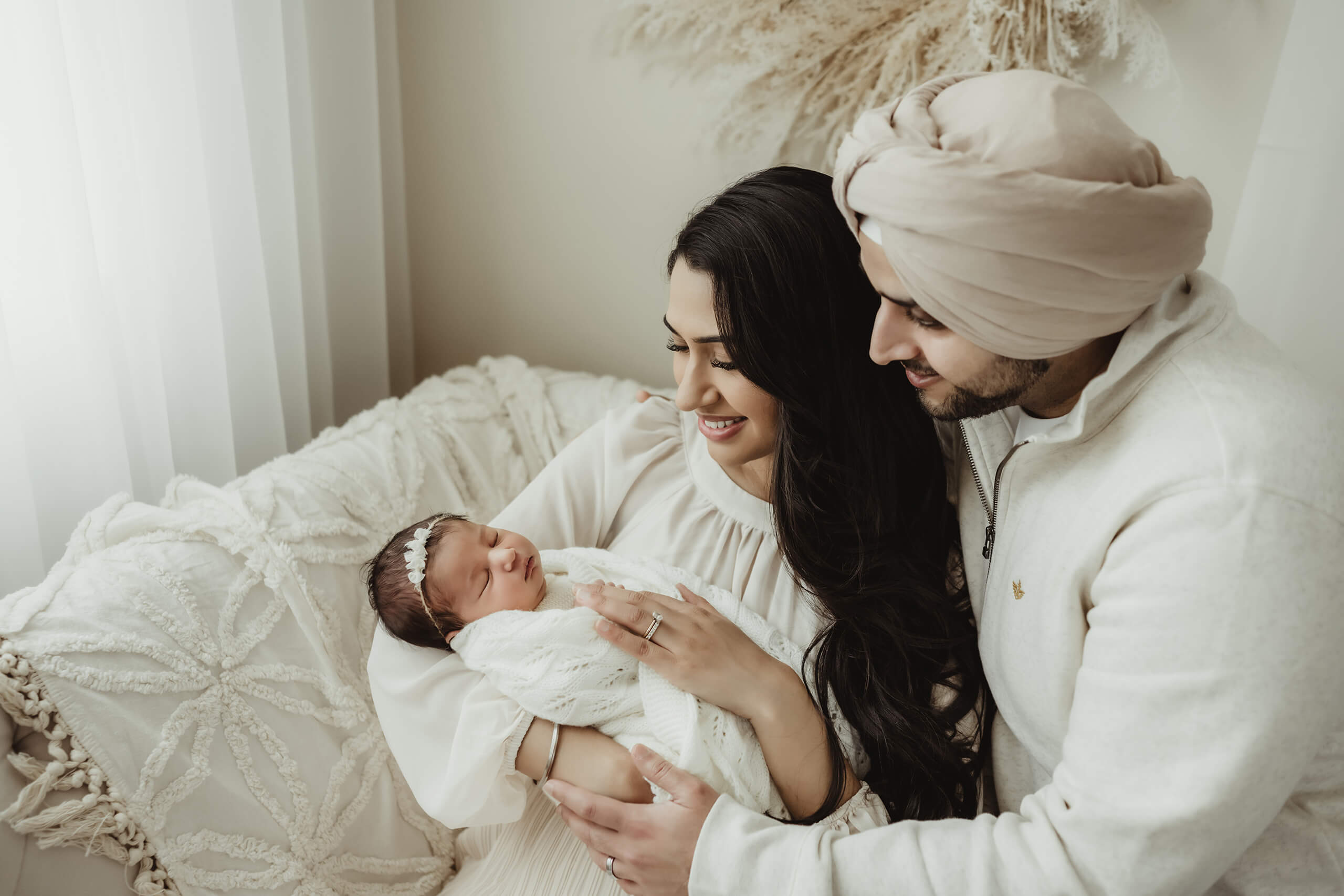 Newborn photography with family in a studio near Sammamish