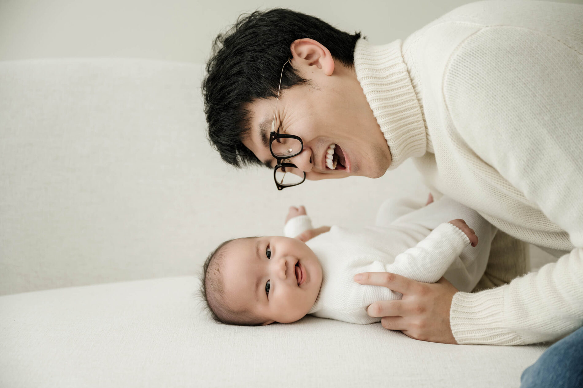 Family portrait of dad and son in Seattle photography studio