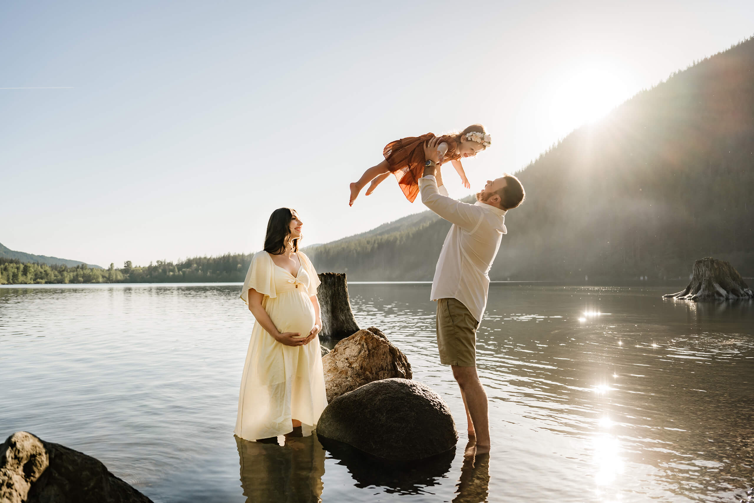 Seattle outdoor family maternity session at a lake with mountain views in the background