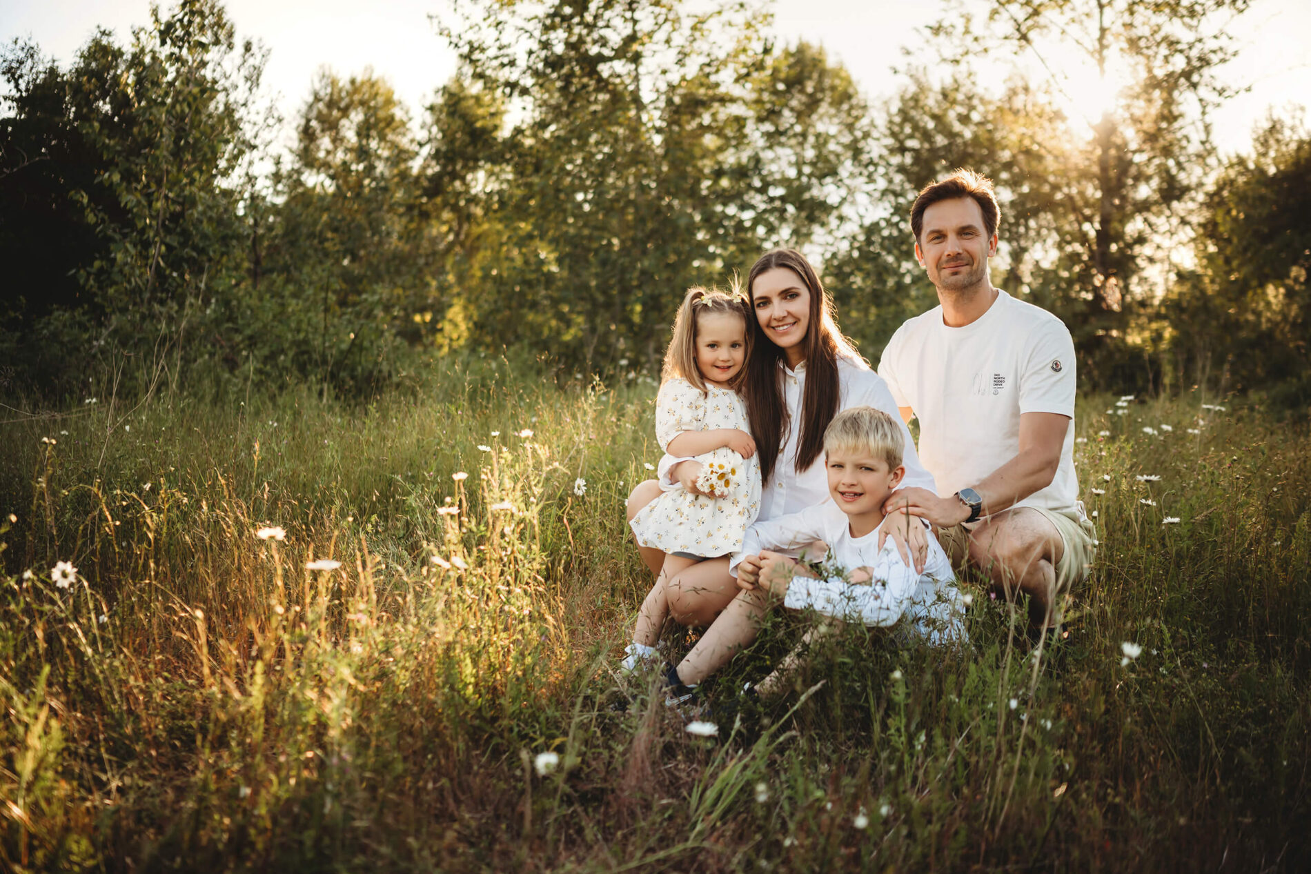 Natural family portrait in a wildflower field in Seattle