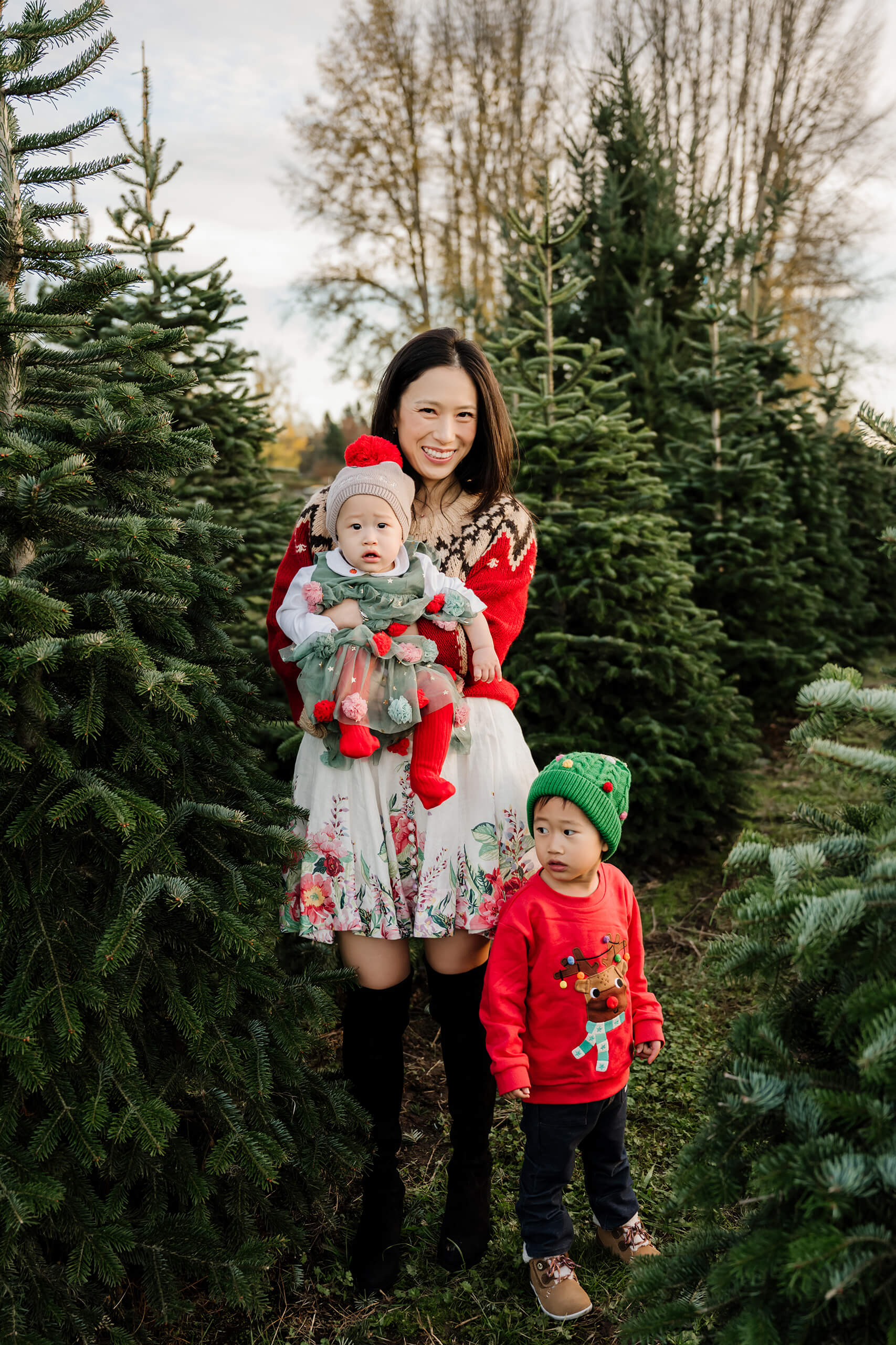 Mother with toddler and baby – Holiday family photo session at Seattle Christmas tree farm.